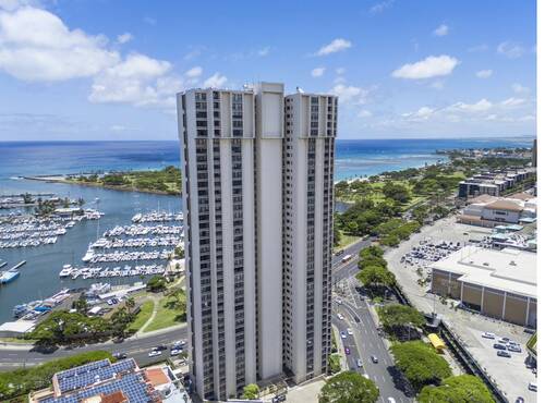 Aerial view of Yacht Harbor Towers and marina