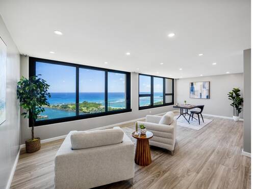 Living room with ocean view windows