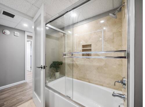 Bathroom shower enclosure